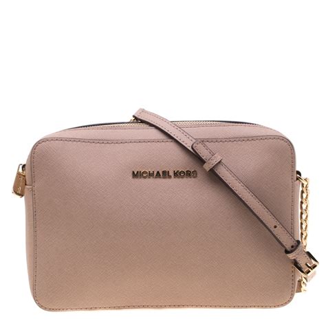 michael kors purse beige front flap|Michael Kors purse thick strap.